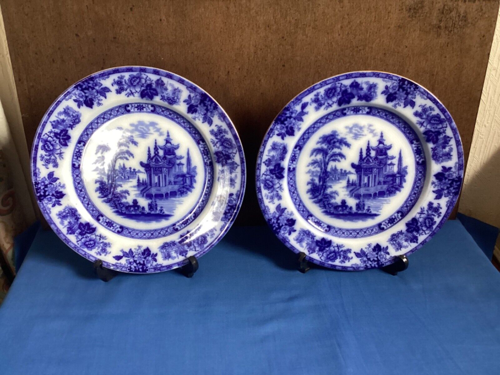 A pair of matching Doulton Burslam ' Madras 'flow blue plates. C1900.