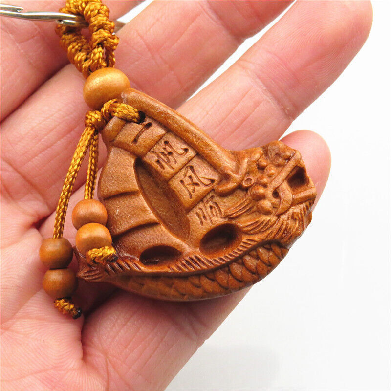 Exquisitely carved mahogany plain sailing key chain
