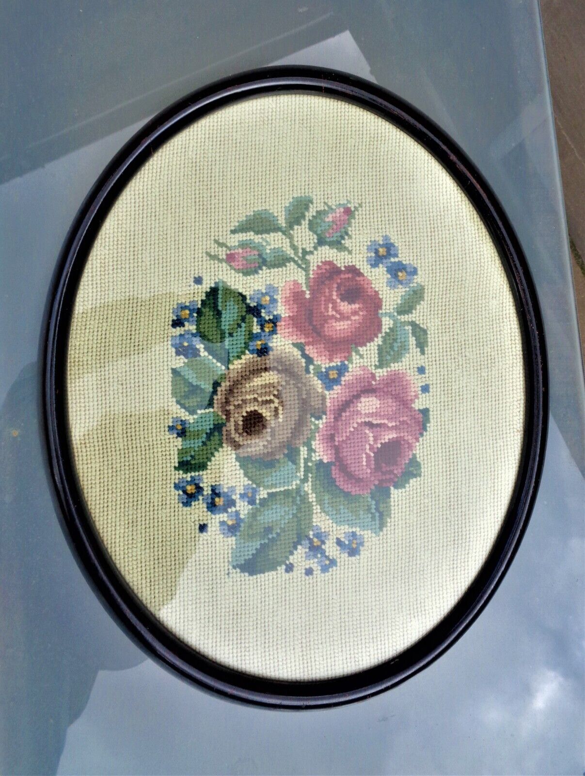 Vintage/Antique: Oval tapestry of Roses behind glass