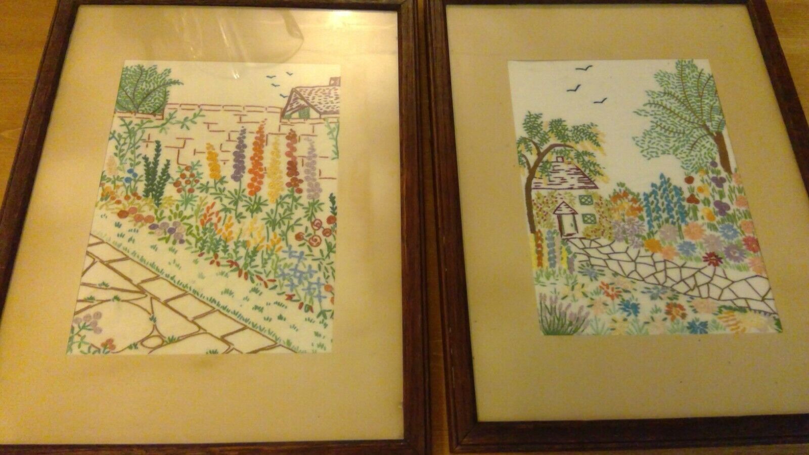 Two Old embroideries framed 1930s-50s garden cottage flowers colourful