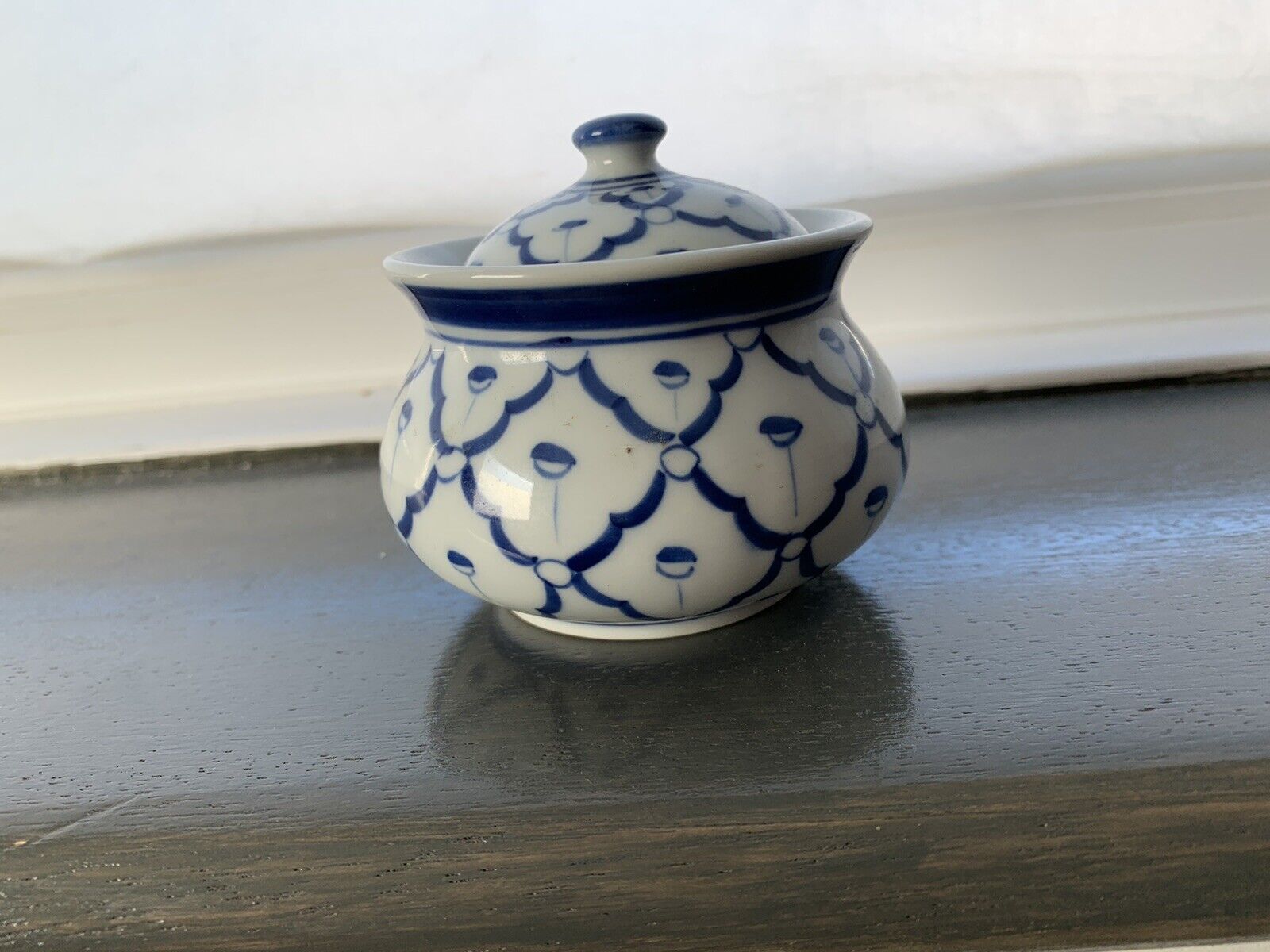 small porcelain jar with slot Thai