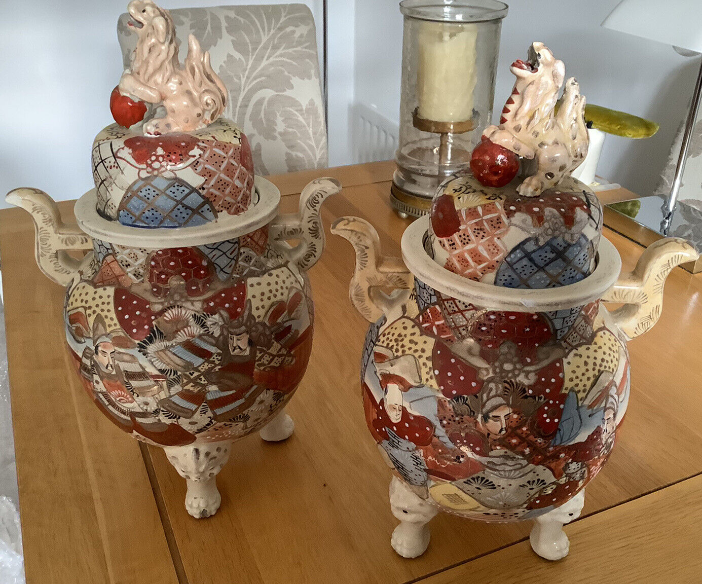 Antique Valuations: Pair of Antique Satsuma 3 Legged Urns with Foo Dog Top