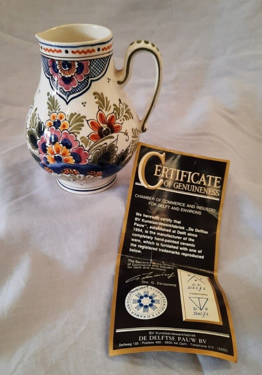 Antique Valuations: Delft Pottery Small Jug with Certificate of Genuineness.