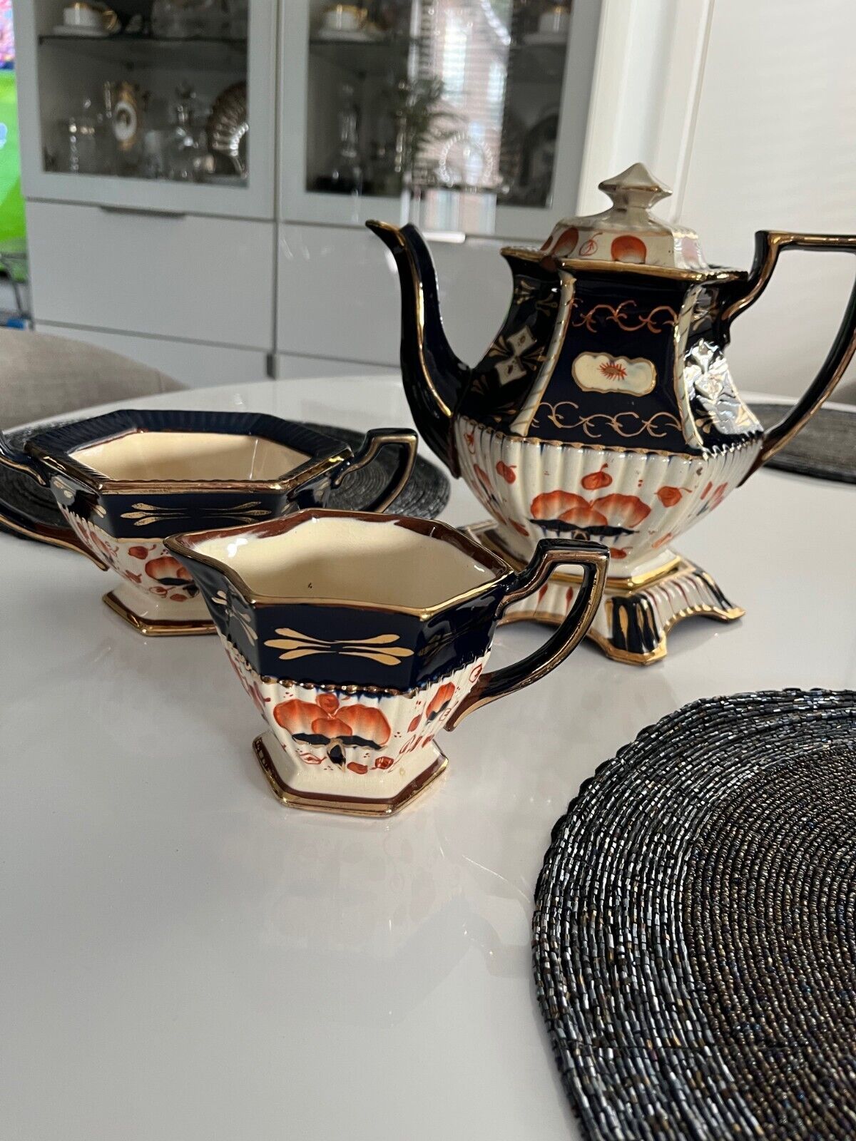 Antique Valuations: Victorian Royal Davenport Teapot on Stand, milk jug and sugar bowl set