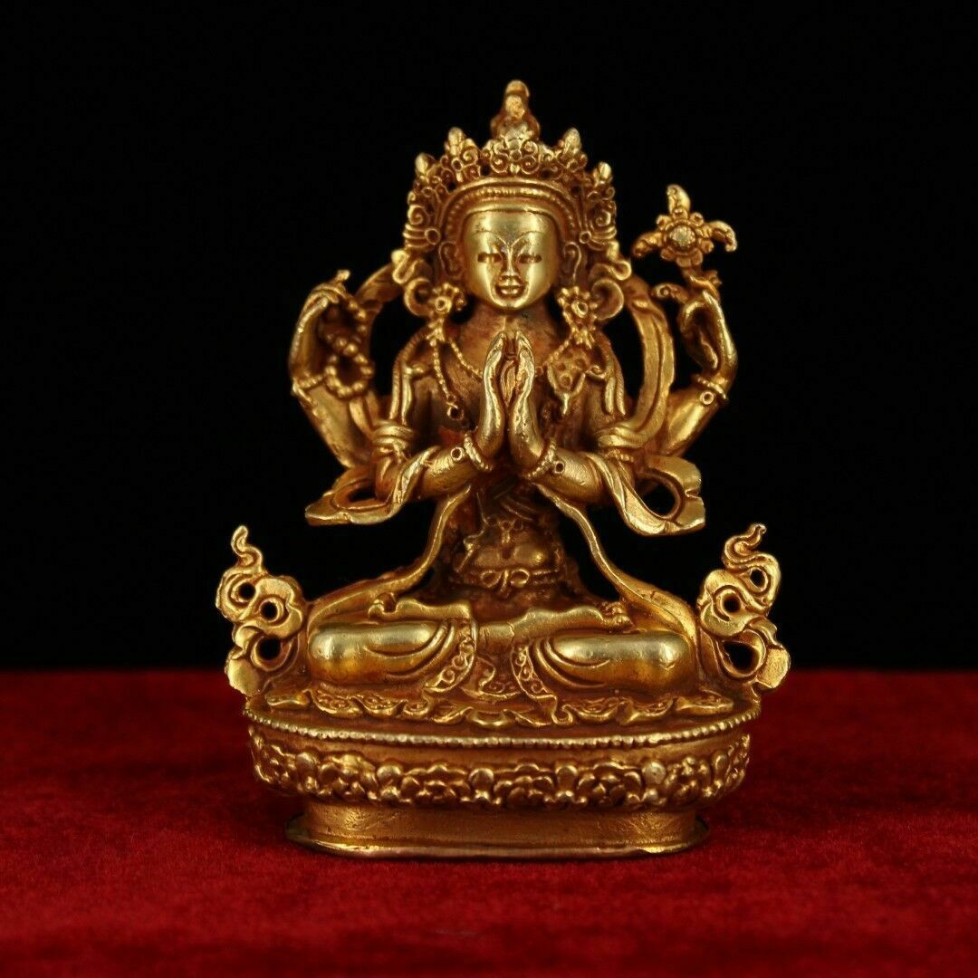 Antique Valuations: China Antique Tibet handmade red copper gilt four arm guanyin Buddha statue