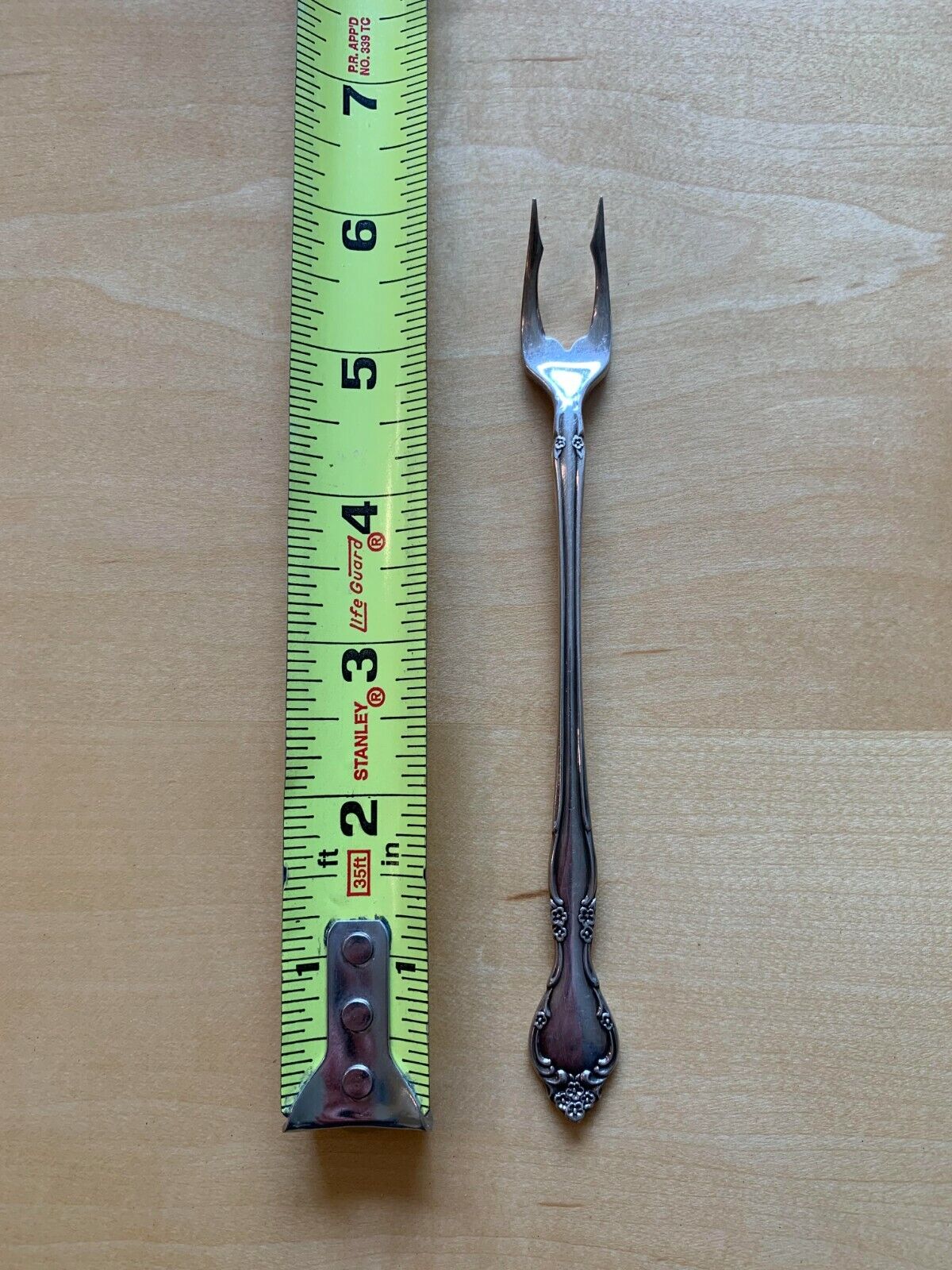Antique Valuations: Community Pickle Olive Fork, possibly Oneida Affection Pattern
