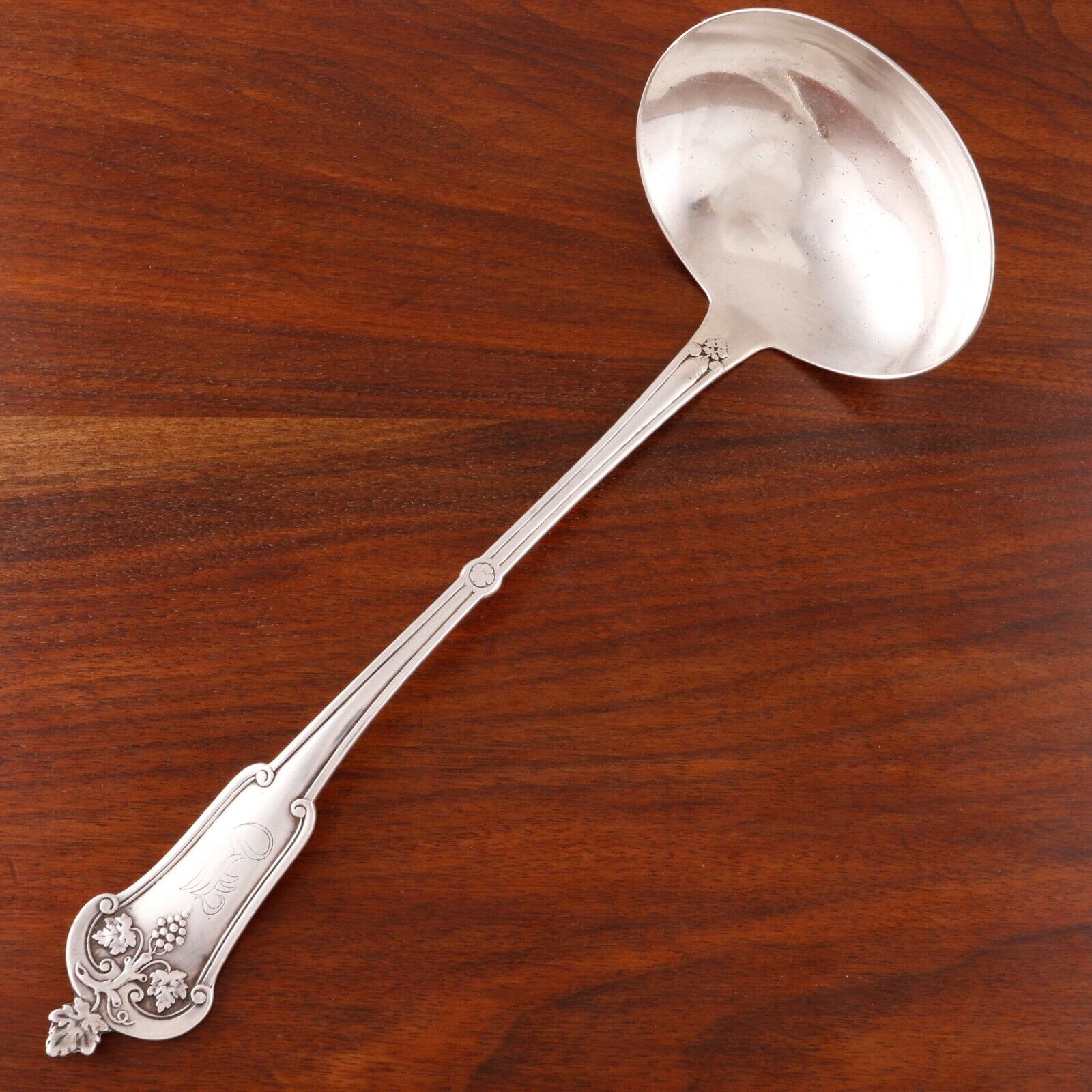 Antique Valuations: FARRINGTON & HUNNEWELL COIN SILVER SOUP / OYSTER LADLE GRAPE VINE 1835-85